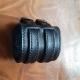 Bracelet de force noir en cuir